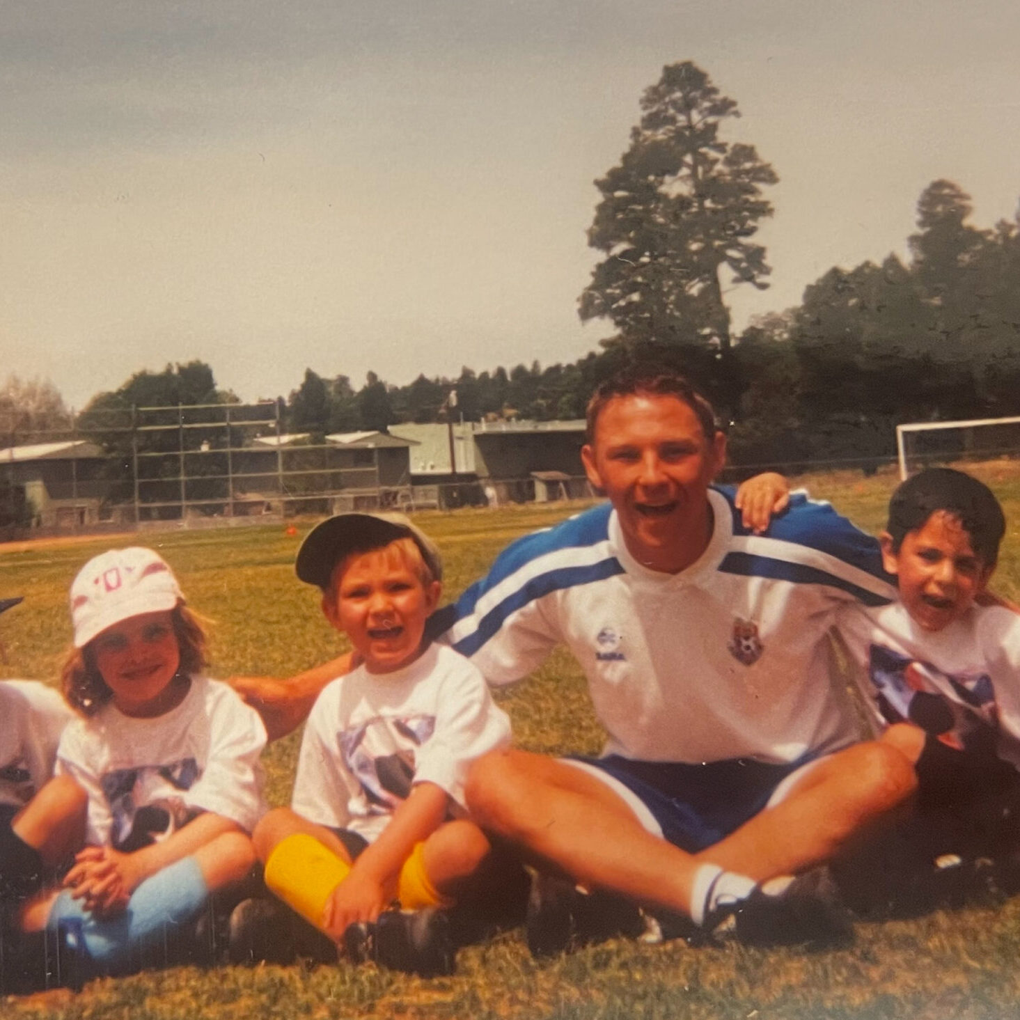 2001 Challenger Soccer Camp Photo with kids & young coach 2001 Challenger Soccer Camp Photo with kids & young coach