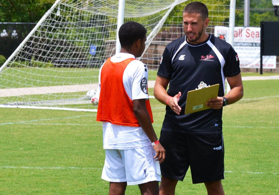 Coach chatting directly with soccer player on Elite Camp Coach chatting directly with soccer player on Elite Camp