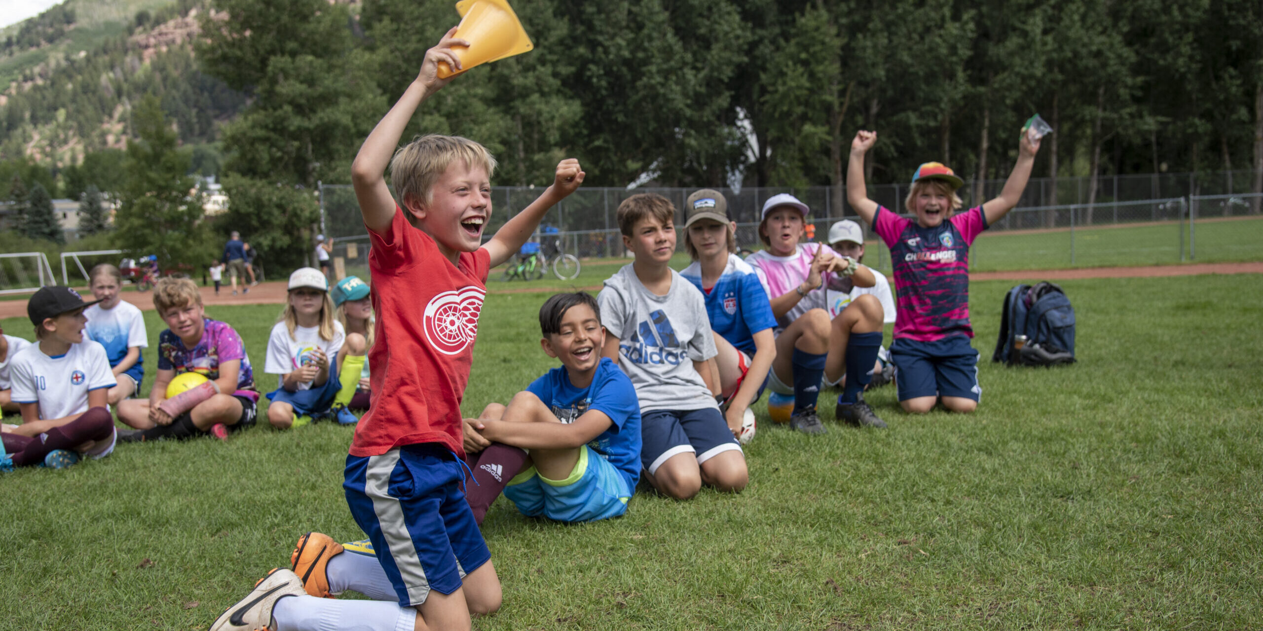 Happy kids cheering on camp Happy kids cheering on camp